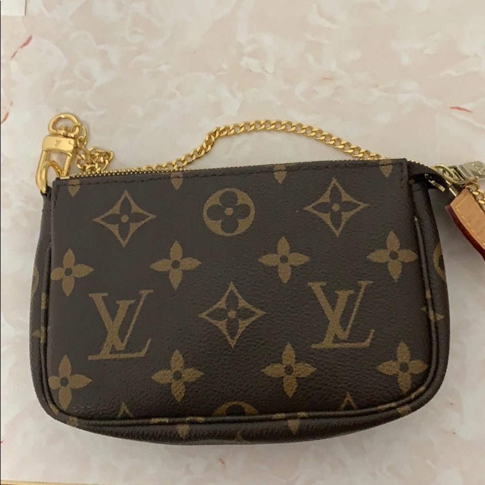 Authentic Louis Vuitton mini pochette